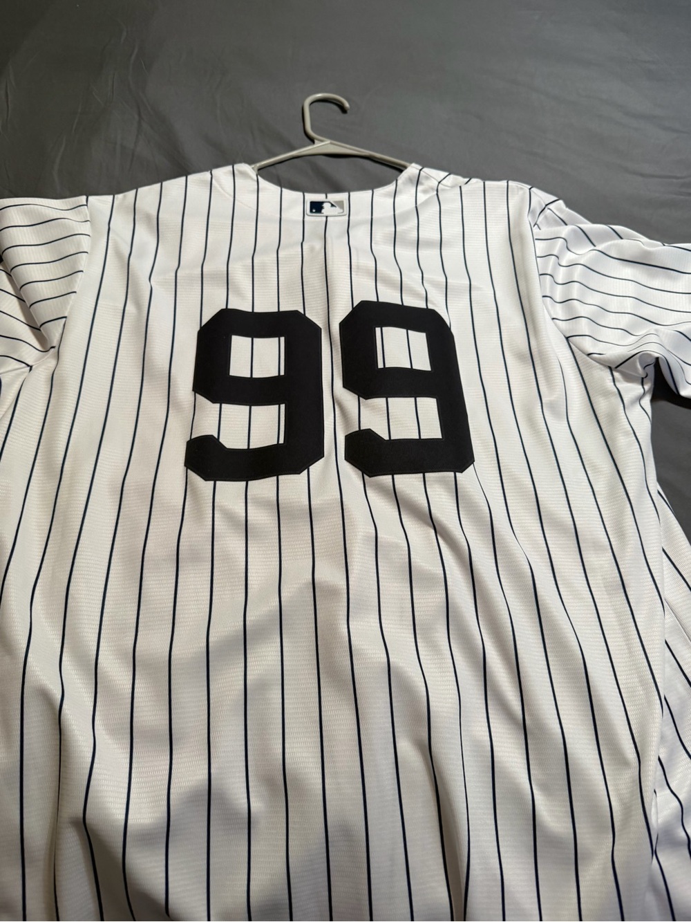 Nike MLB Men’s White Pinstripe Jersey with Black Number 99